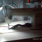 Revue de photos du dossier de bord courbe de reliure de machine à coudre
